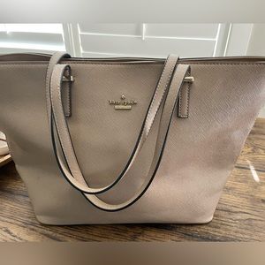 Kate Spade New York beige bag.